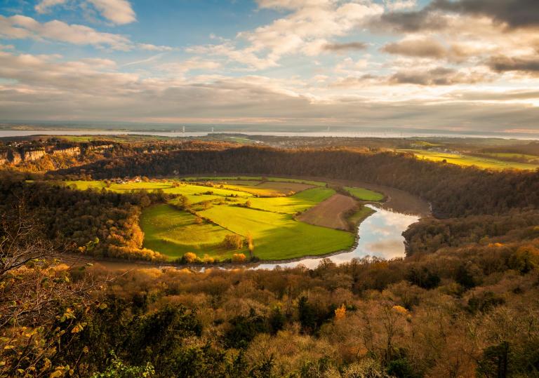 The River Wye surrounded by autumnal trees and fields