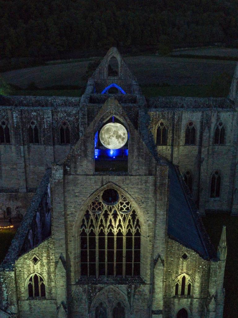 Tintern Abbey in the eerie glow of night.