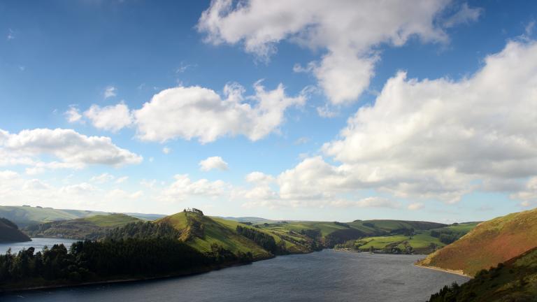 Clywedog reservoir from above on a sunny day.