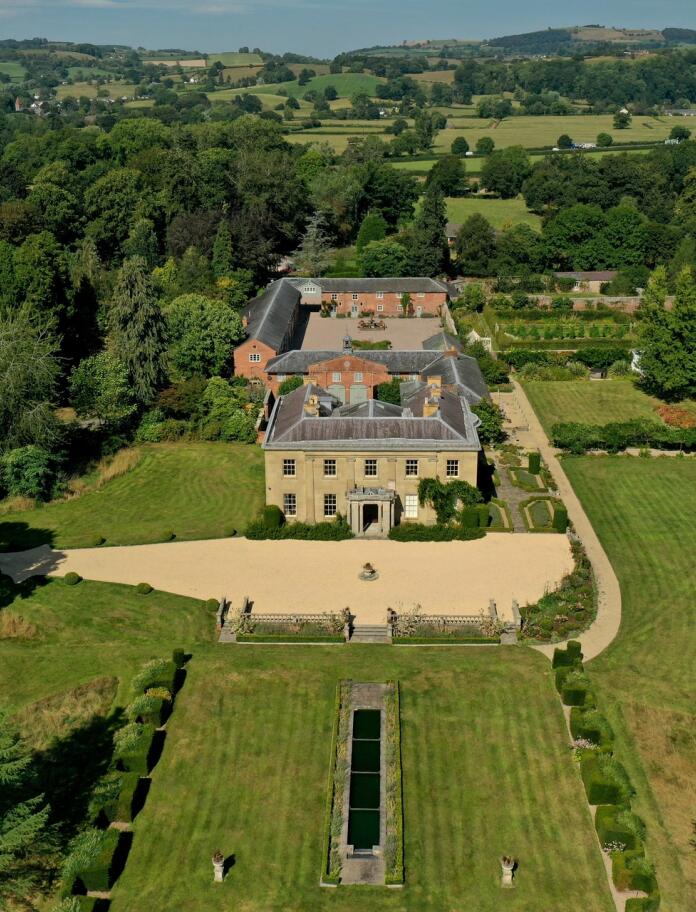 aerial view of stately home and gardens.