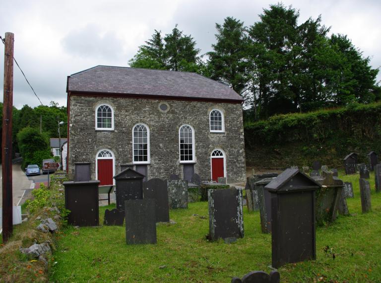 exterior view of chapel with graveyard in foreground