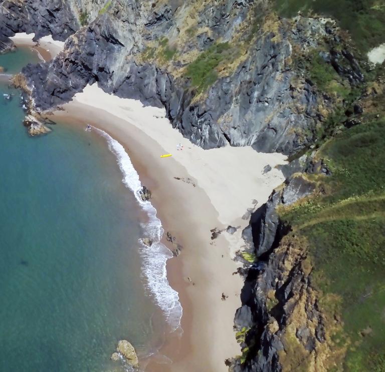 Aerial view of Llangrannog beach and the cliffs