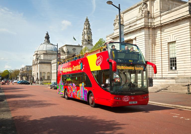 Image of a City Sightseeing bus outside National Museum in Cardiff