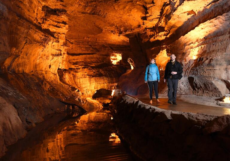 Couple enjoying the spectacular caves at Dan-yr-Ogof National Showcaves Centre for Wales
