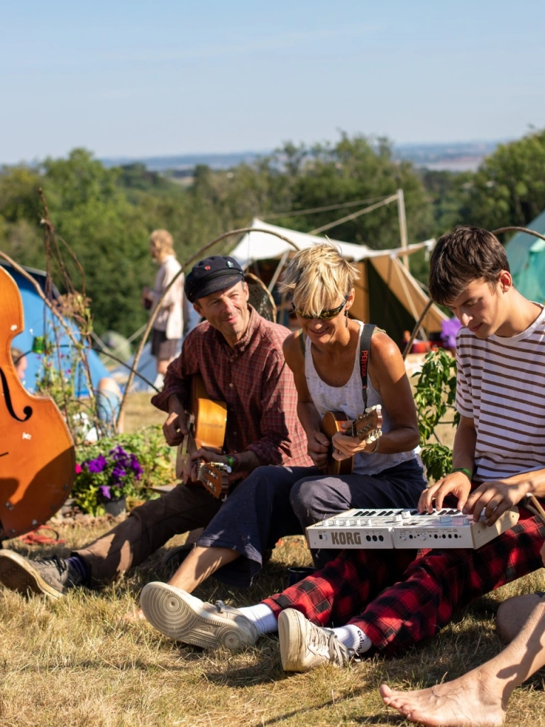 people playing instruments at festival.