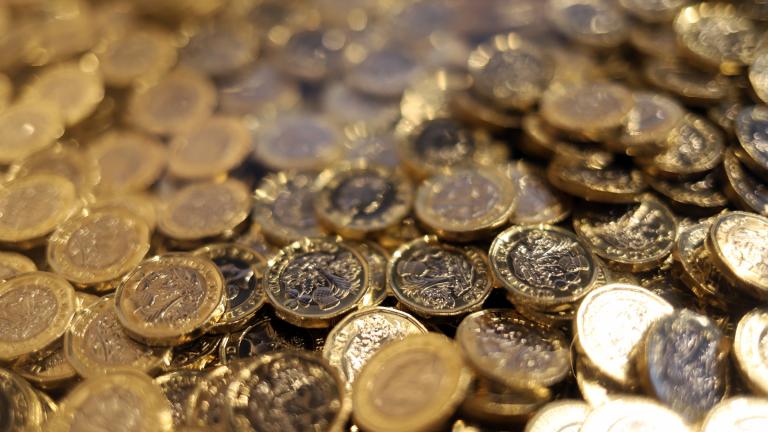 Image of pound coins at the Royal Mint Experience