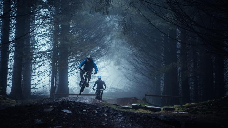 Two mountain bikers on a trail at Bike Park Wales.