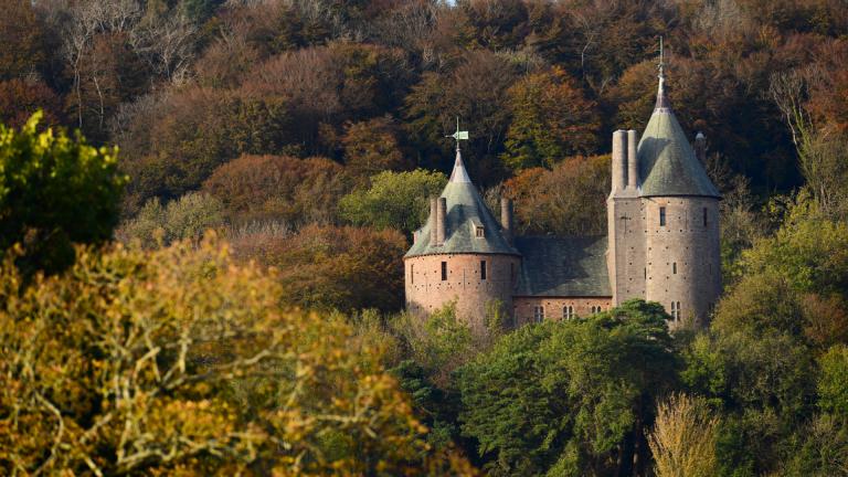 The turrets of Castell Coch among the trees in Cardiff, South Wales