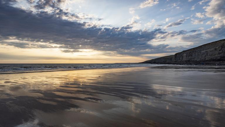 Tide out at Southerndown beach at sunset.