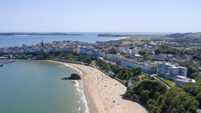 Aerial view of beach and town.