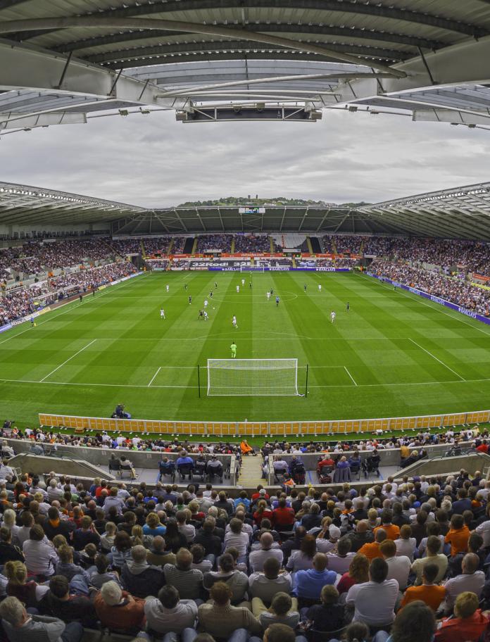 Football match taking place at Liberty Stadium Swansea.