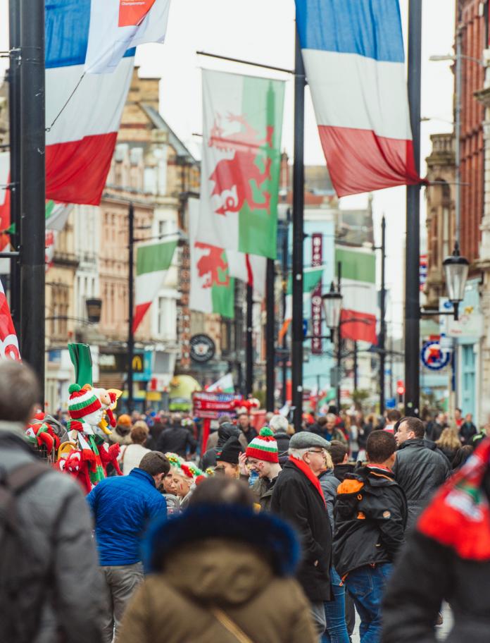 Rugby fans crowding the streets of Cardiff.