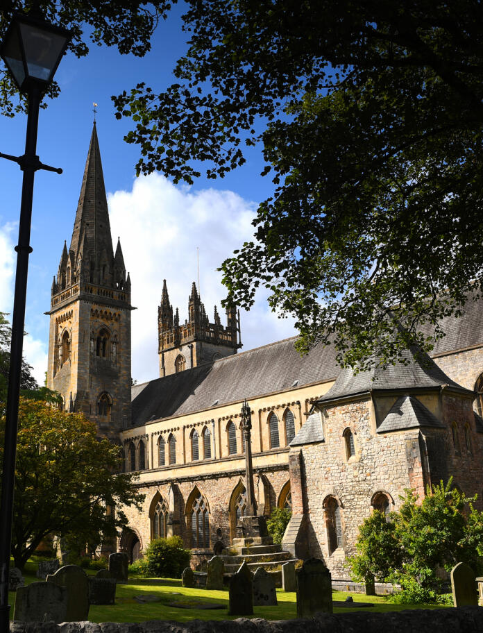 Exterior of Llandaff Cathedral on a sunny day.