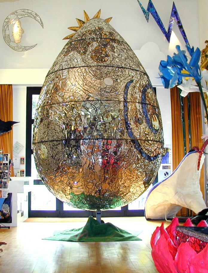 A large mosaiced egg in an art gallery.