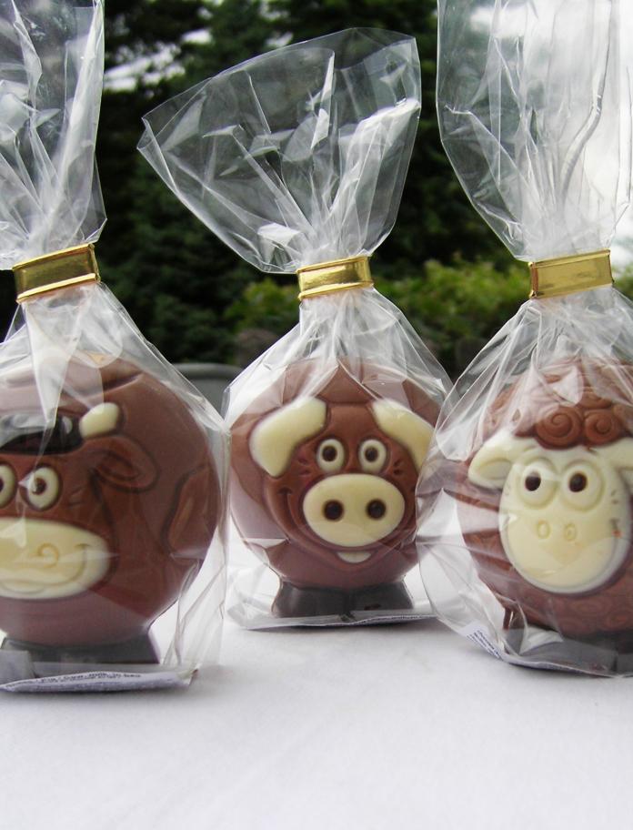 Three Chocolate animals in cellophane wrappers.