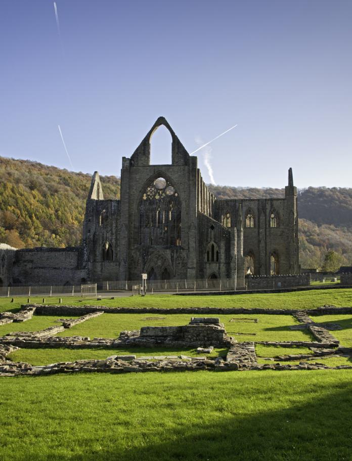 abbey ruin with surrounding countryside.