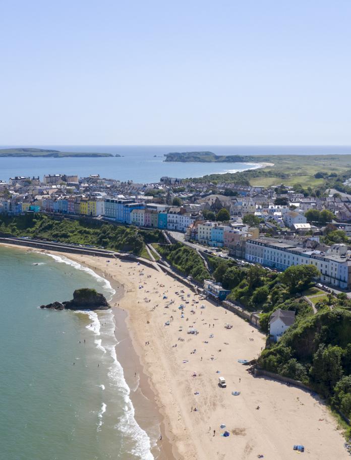 Aerial view of beach and town.