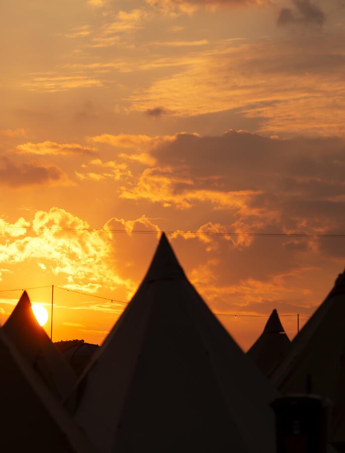 Sunset over the festival tents
