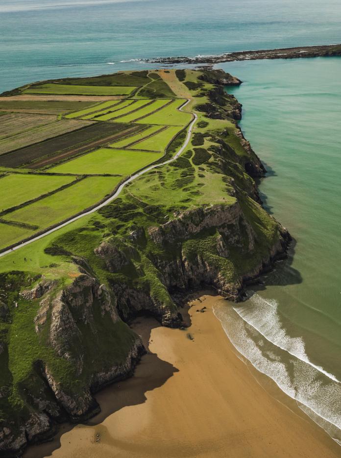 Aerial view of Rhossili beach and Worm's Head.
