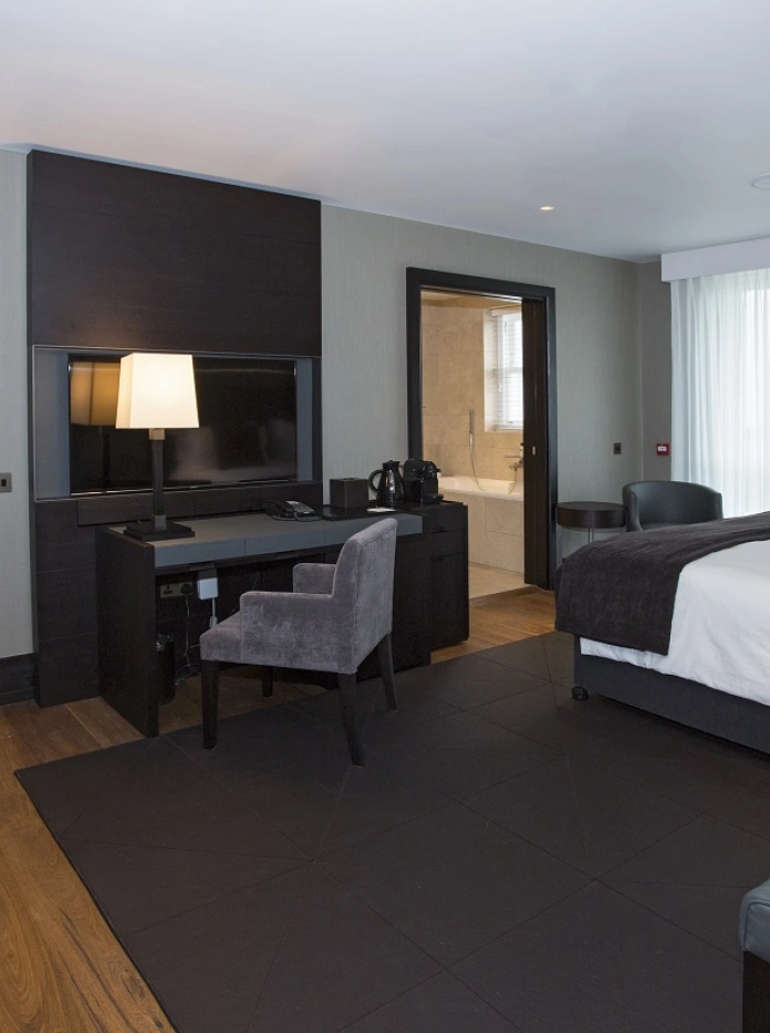 Interior of accessible bedroom - large bed and plenty of floor space