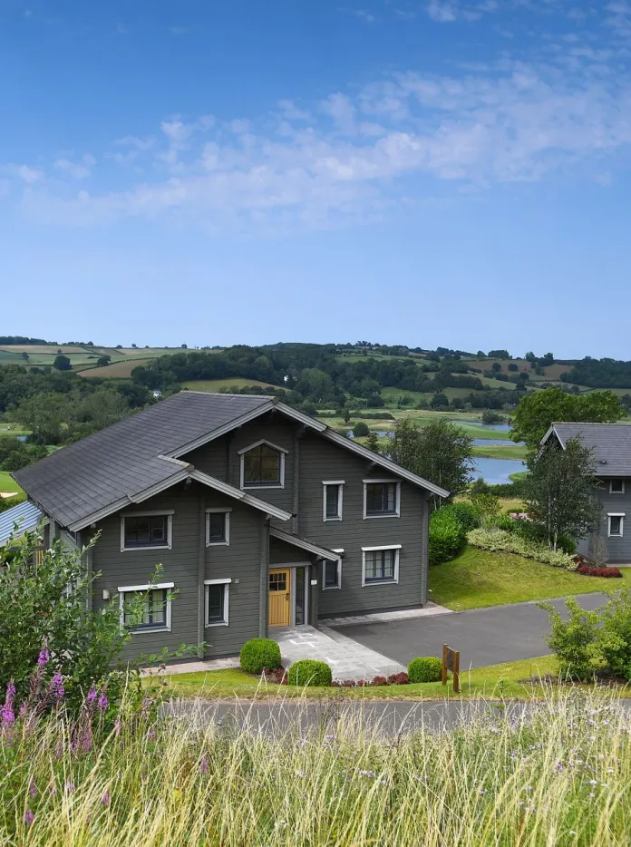 exterior of lodges in countryside surroundings