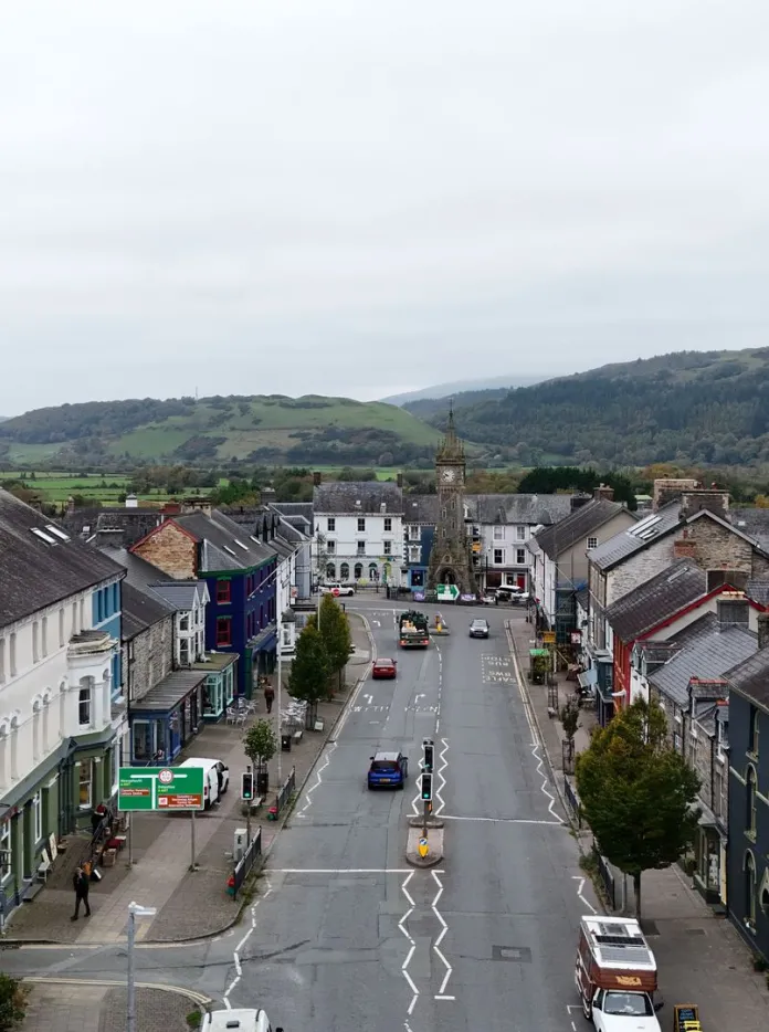 Aerial view of Heol Maengwyn in Machynlleth, with hills in the background.