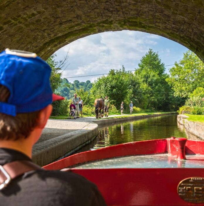Boy on canal boat trip on the Llangollen Canal.
