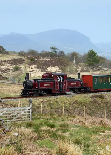 Ffestiniog Railway steam engine winds its way through the Dduallt station spiral loop 
