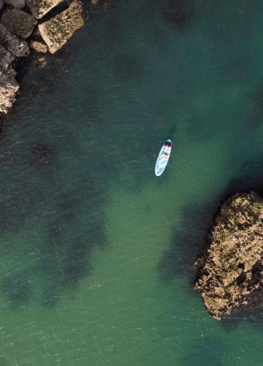 Aerial view of a kayaker in the sea