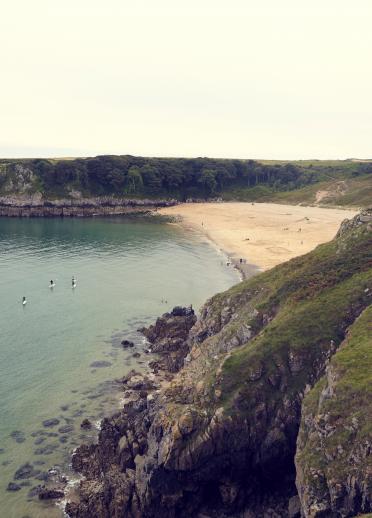 Stand-up paddleboarders at Barafundle Bay