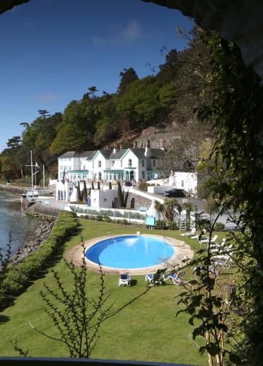 Hotel Portmeirion and the outdoor swimming pool on a sunny day.