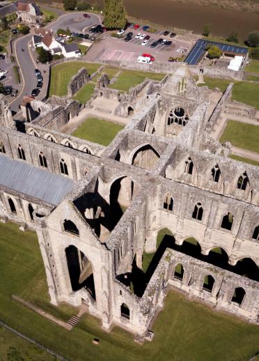 Aerial shot of the grand ruins of Tintern Abbey.