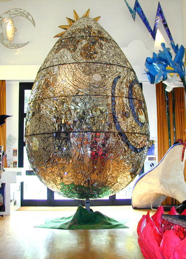A large mosaiced egg in an art gallery.