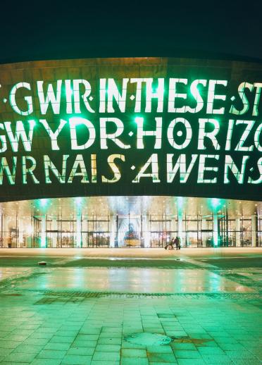 Exterior of Wales Millennium Centre at night.