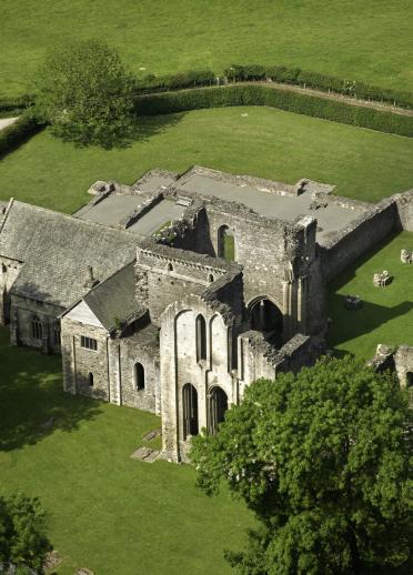 A semi-ruined abbey from above.