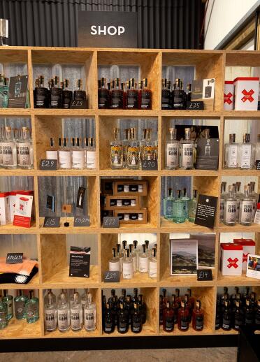 shelves with bottles of gin.