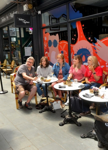 Group of people attending a guided food tour.