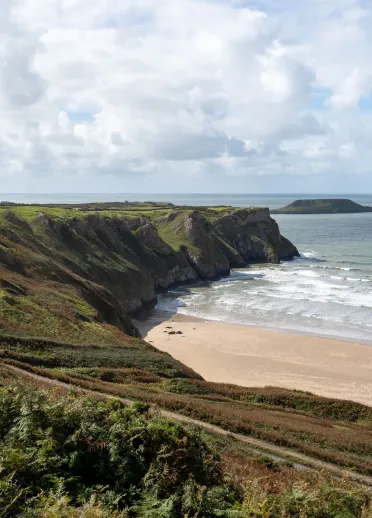 Worm's Head headland and sea, viewed from coastal path.