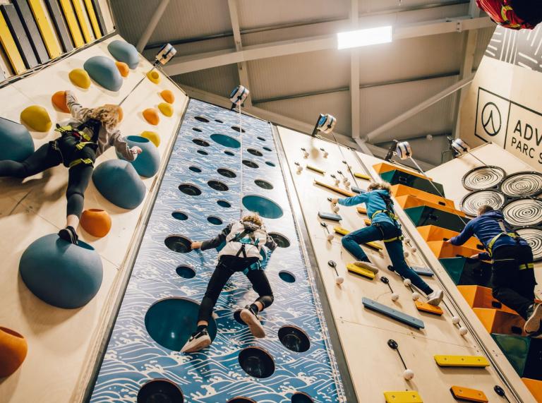 Scaling the indoor adventure climb at Adrenaline Indoors, Adventure Parc Snowdonia.