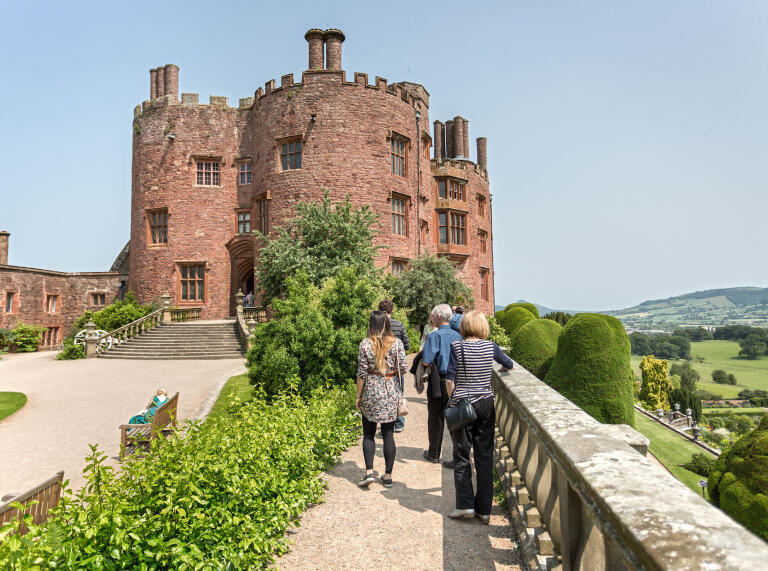 People in gardens at Powis Castle.