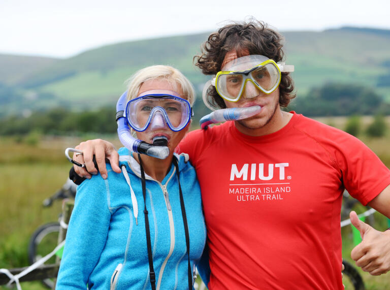 Image of two people wearing snorkels and masks