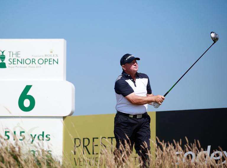 Ian Woosnam swinging a golf  club while playing at The Senior Open Championship at Royal Porthcawl Golf Club