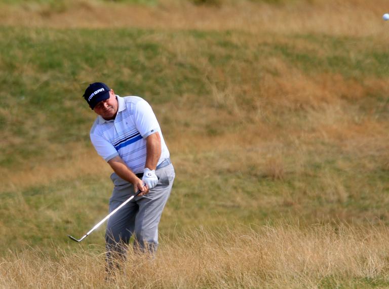 Ian Woosnam swinging a golf  club while playing at The Senior Open Championship at Royal Porthcawl Golf Club