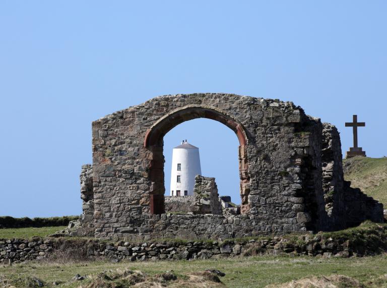 Llanddwyn Island's lighthouse and ruined church.