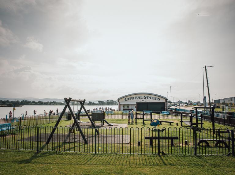 Rhyl Marine Lake Play Park showing a play park and the lake.