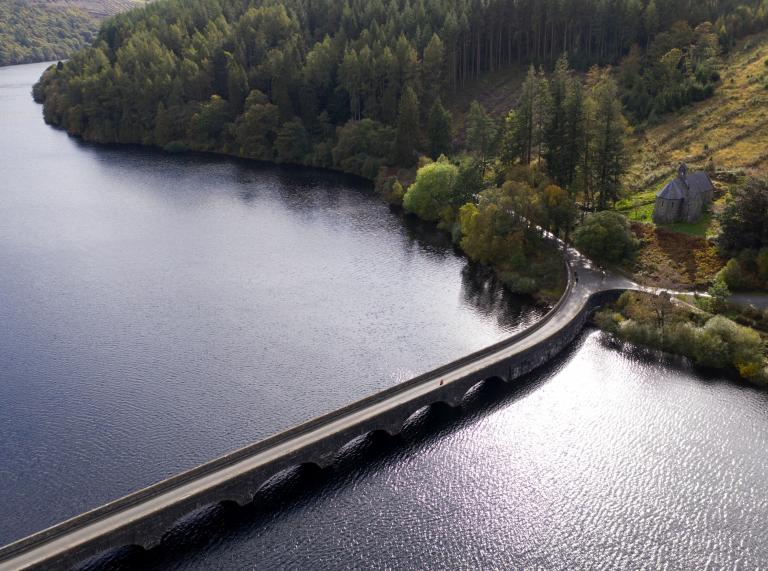 A road running across a reservoir