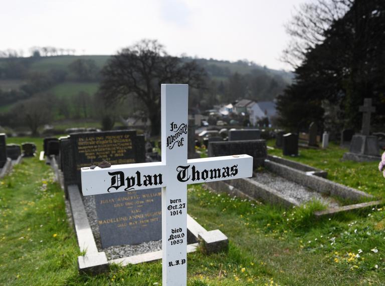 Dylan Thomas's grave at St Martin's Church - a white, wooden cross.