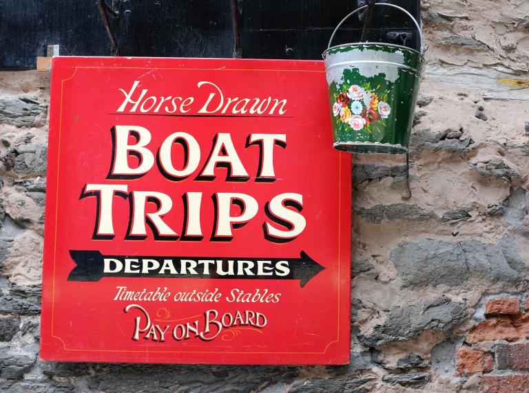 Boat trips sign in Llangollen.