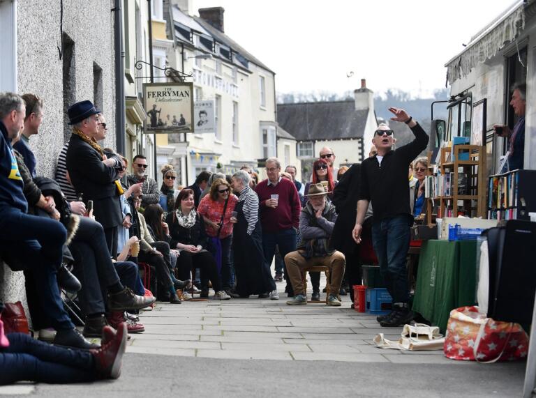 Performers in the street at Laugharne.