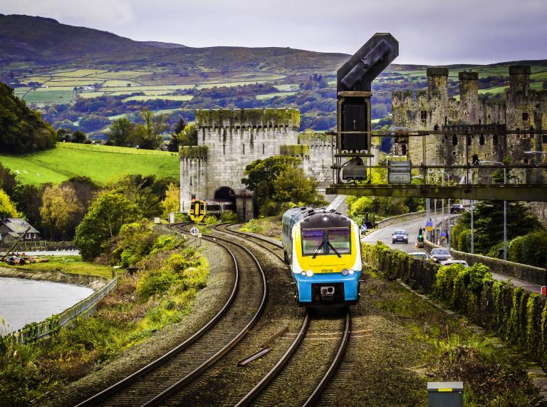 A train by a castle.